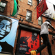 A memorial of Eric Garner, left, next to one of Michael Brown as seen outside of filmmaker’s Spike Lee’s 40 Acres offices on August 15, 2014, in Brooklyn, N.Y.